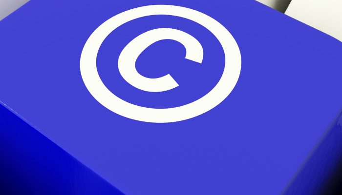 Copyright Computer Key In Blue Showing Patent Or Trademarks
